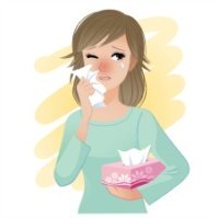 woman with kleenex dealing with common allergies and symptoms